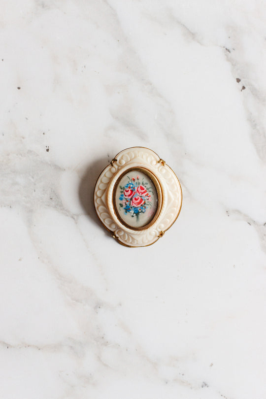 rare 1930s french hand painted floral pin with bakelite border