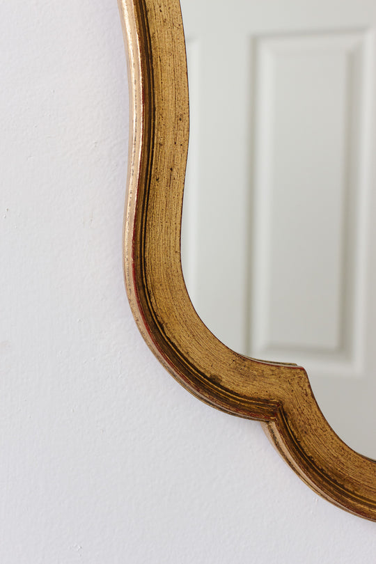 1970s Italian rococo style gilt mirror with scalloped edge