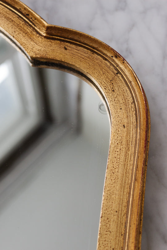 1970s Italian rococo style gilt mirror with scalloped edge