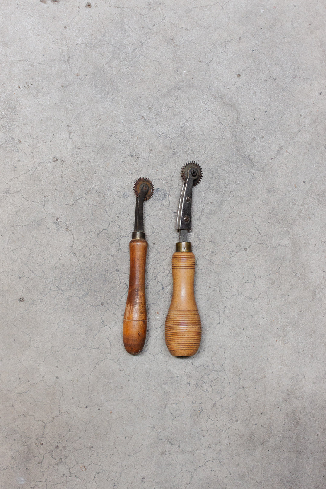 pair of antique french tracing wheels