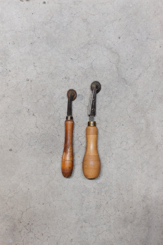 pair of antique french tracing wheels