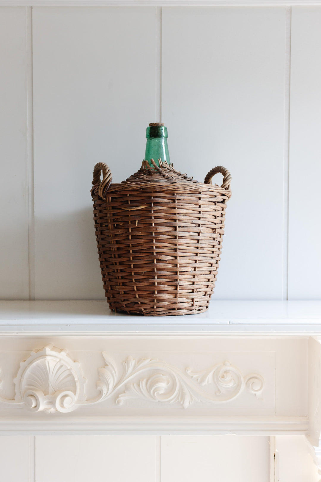 antique french wicker wrapped demijohn