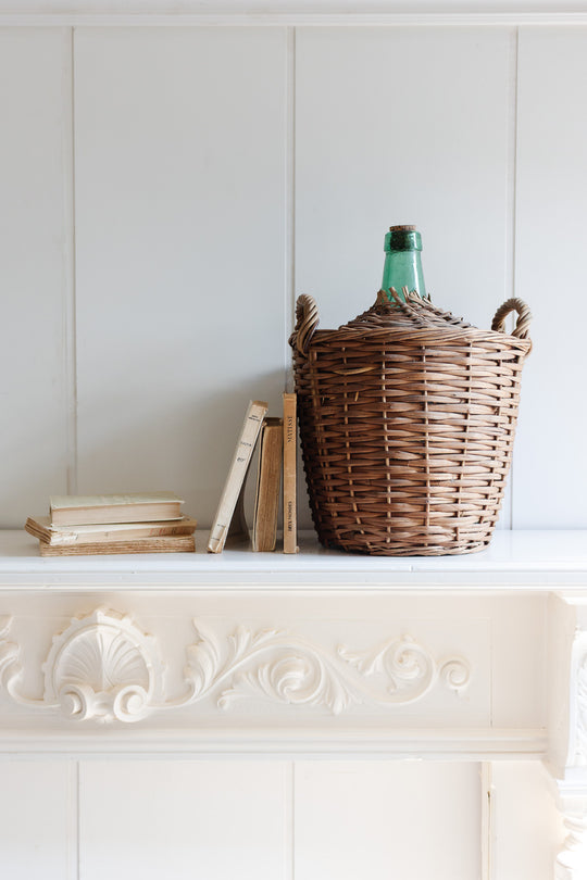 antique french wicker wrapped demijohn