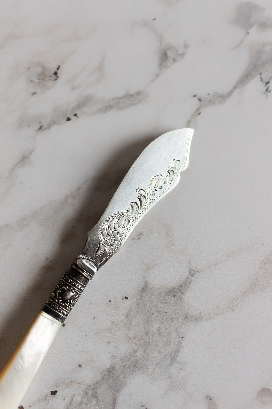 antique french silverplate and mother of pearl butter knife