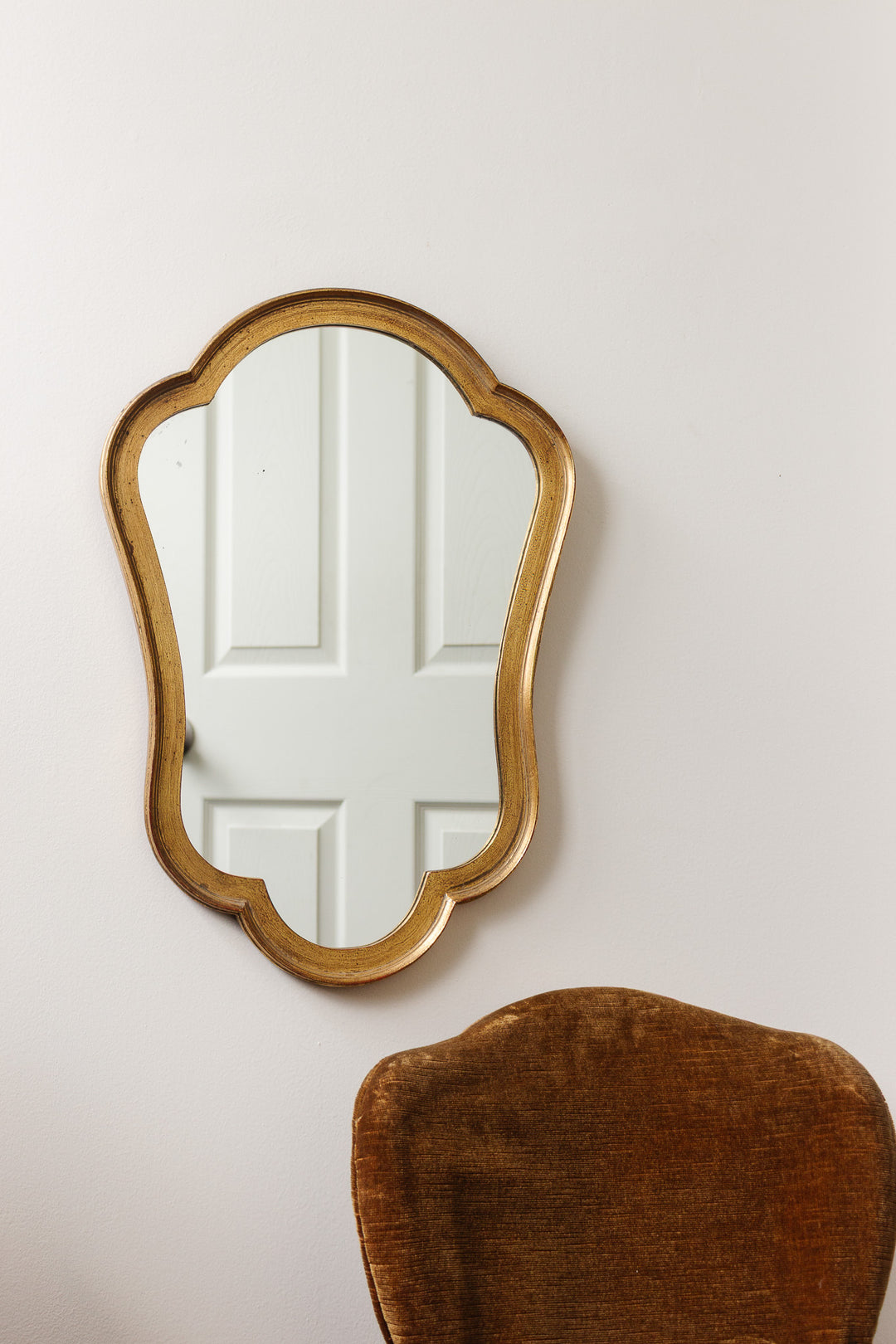 1970s Italian rococo style gilt mirror with scalloped edge