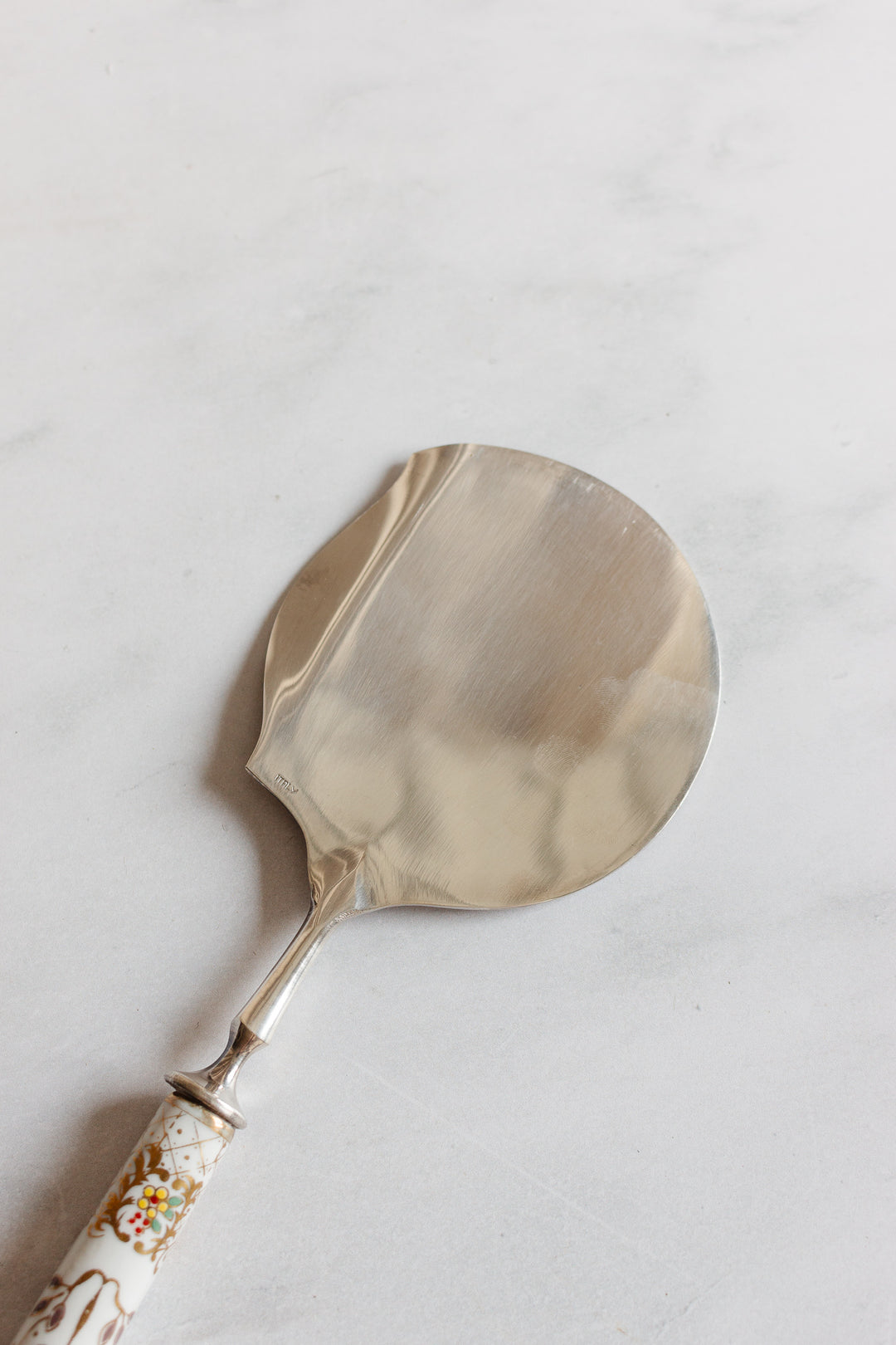 vintage English serving spoon with ceramic handle