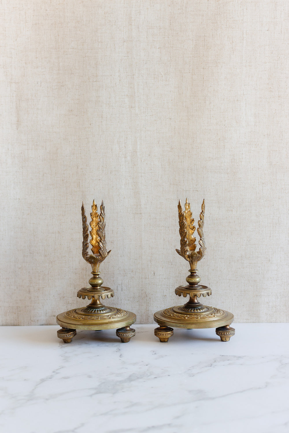 antique french empire revival bronze candlestick pair