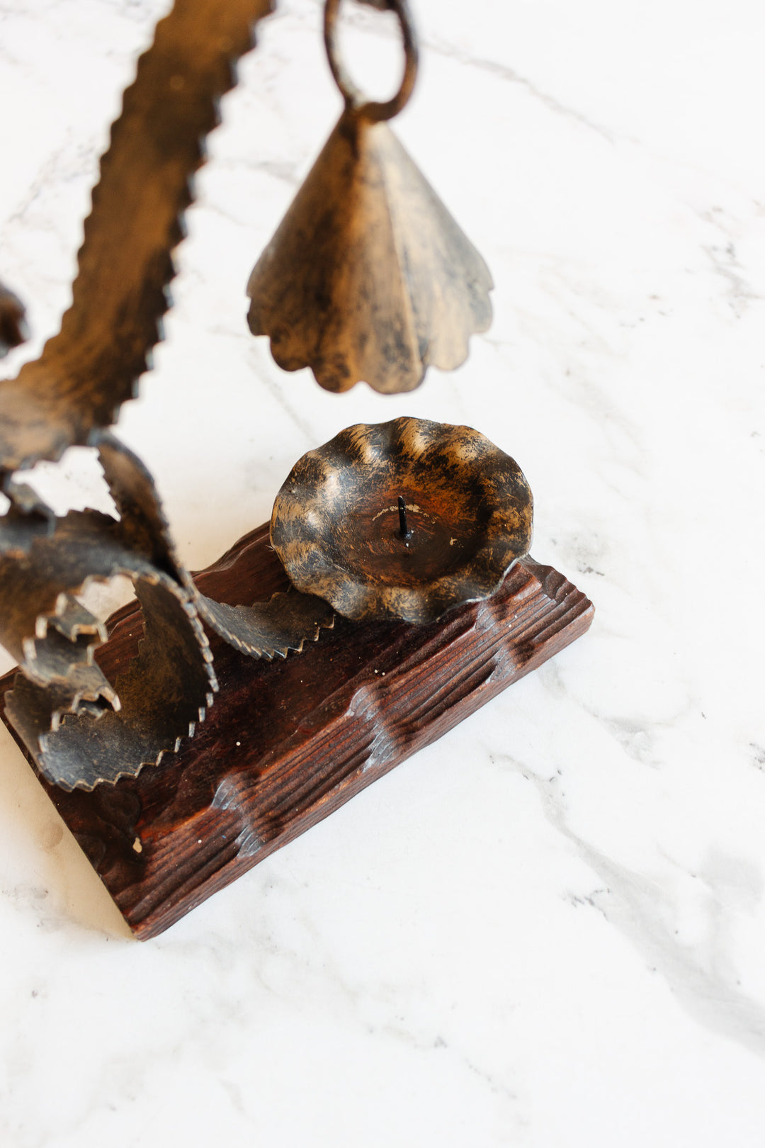 1970s french artisnal hand forged iron candlestick on wood base with snuffer