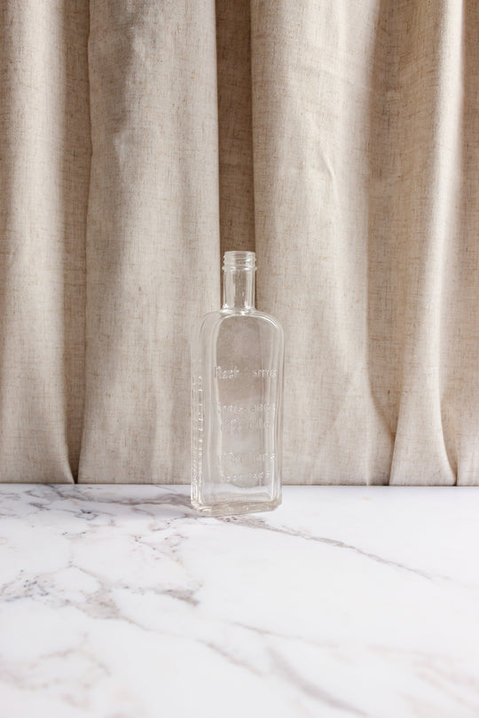 turn of the century French glass pharmacy bottle