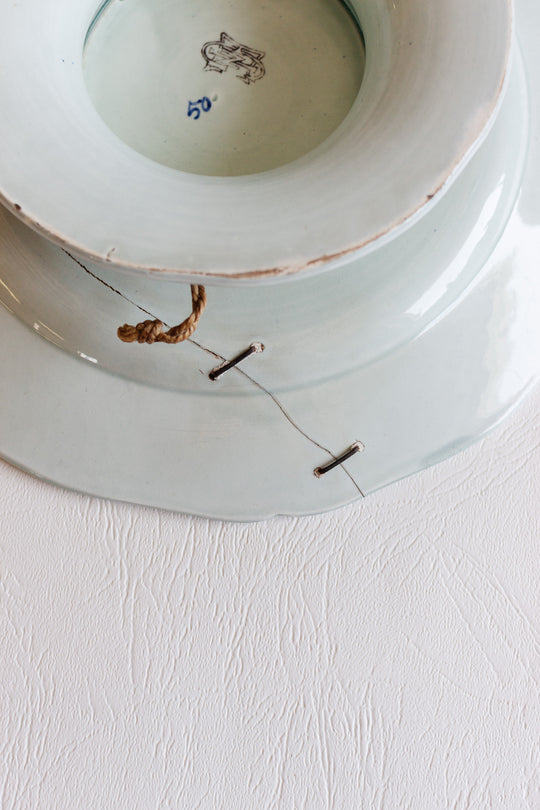 19th century gien cake plate with original staple repair