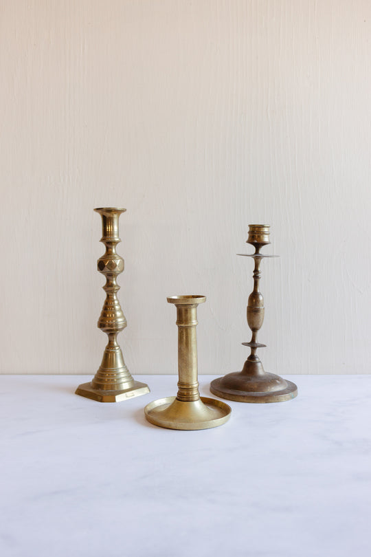 eclectic set of 3 vintage brass candlesticks