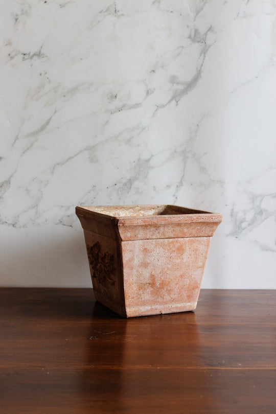 pair of vintage french terra cotta planters with relief detail