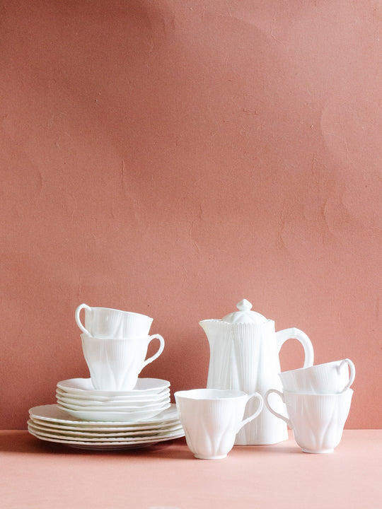 vintage white tea set made up of Shelley and Royal Albert pieces