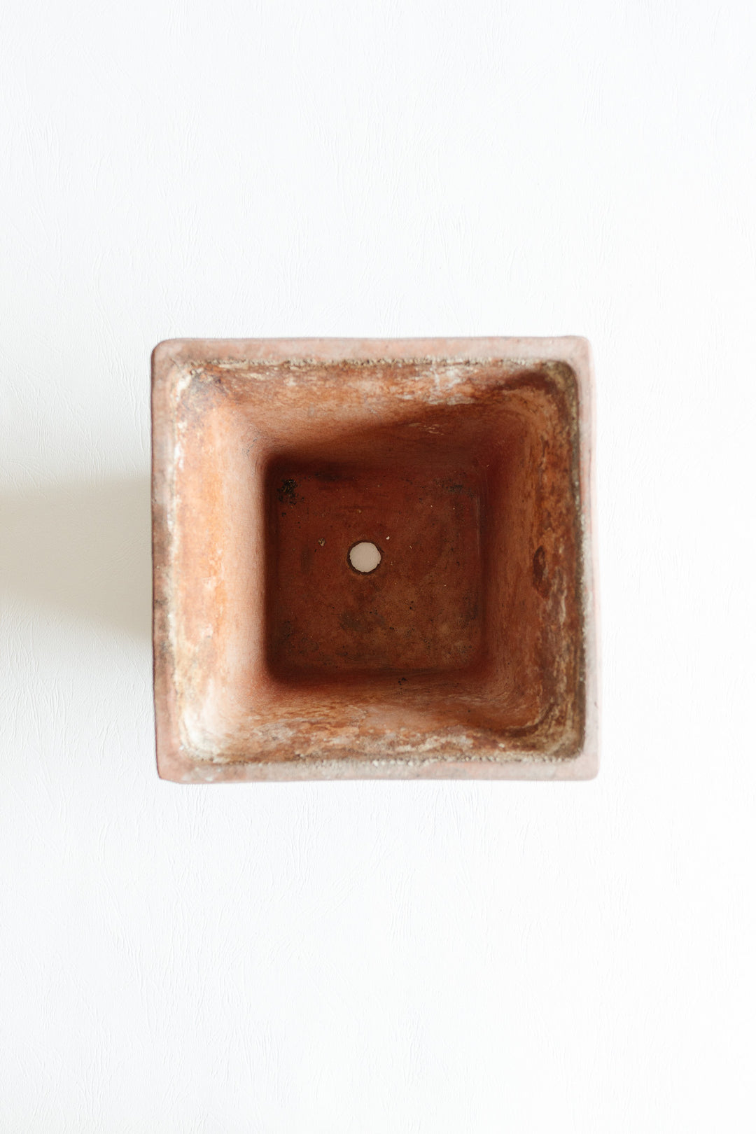 pair of vintage french terra cotta planters with relief detail