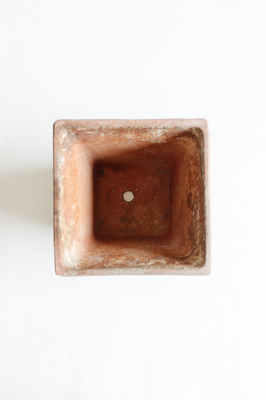 pair of vintage french terra cotta planters with relief detail