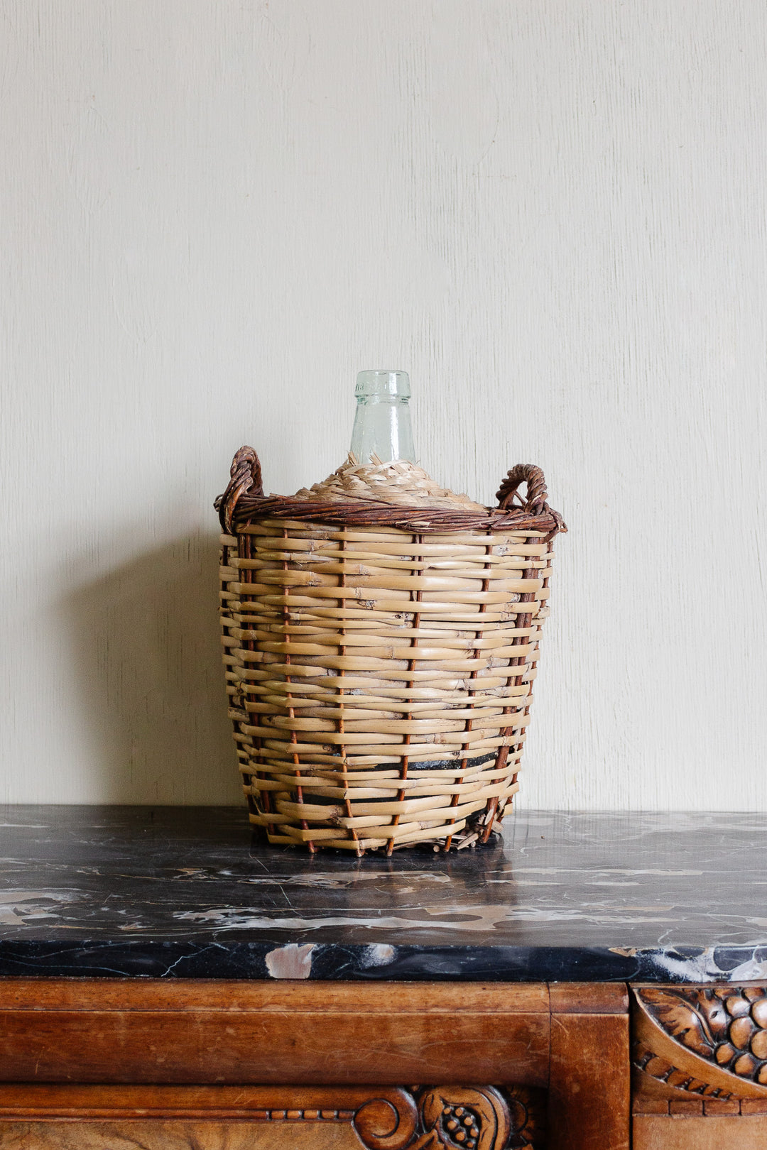 vintage french wicker wrapped demijohn