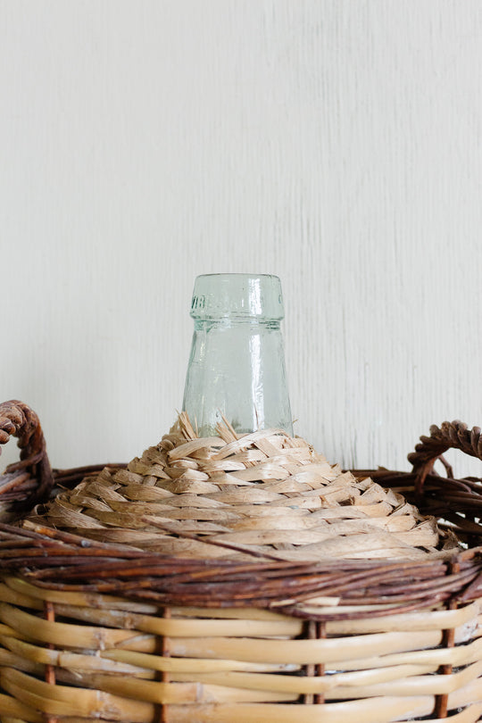 vintage french wicker wrapped demijohn