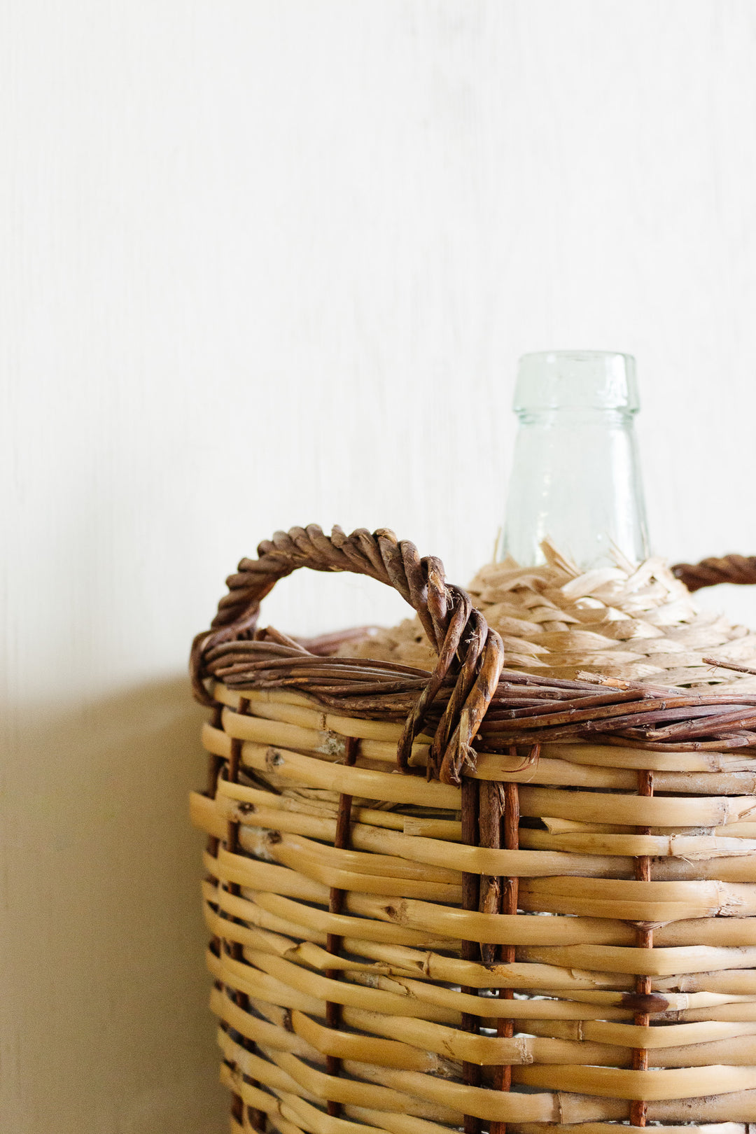 vintage french wicker wrapped demijohn