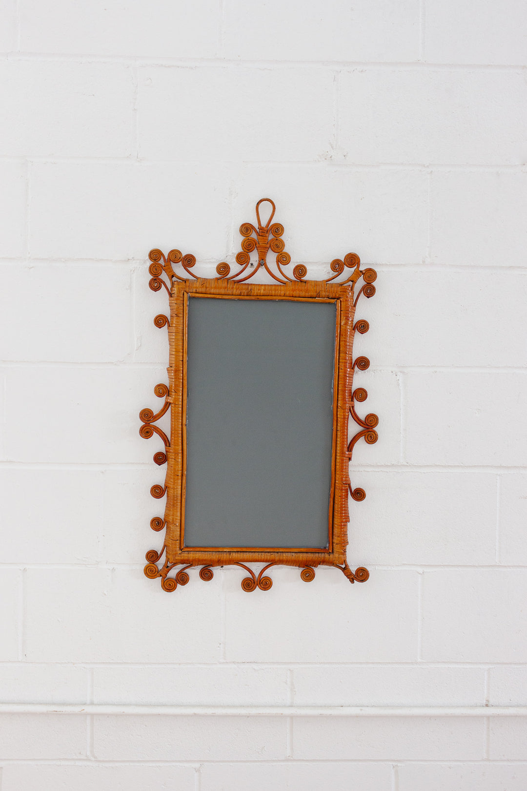 vintage french whimsical rattan mirror