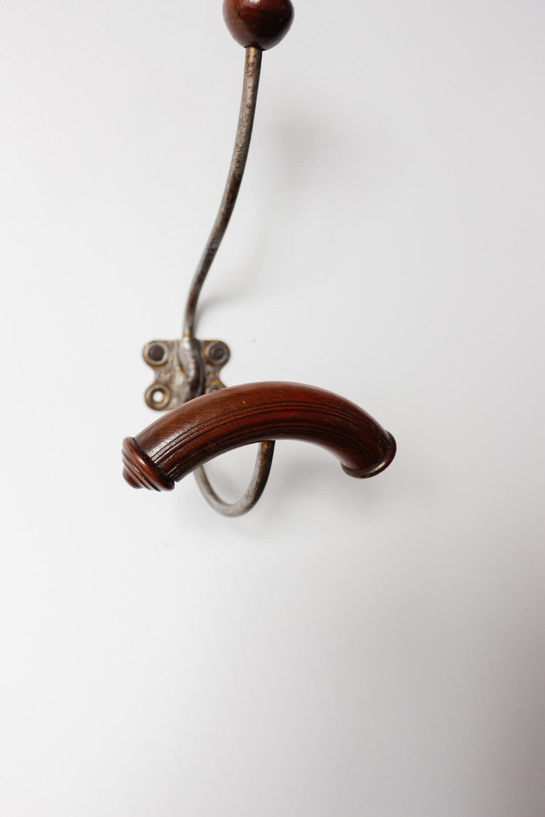 antique french wood and cast iron coat hook, mahogany