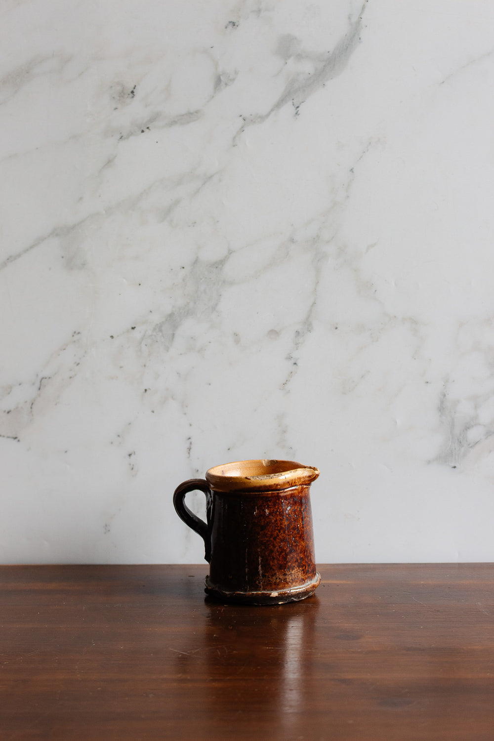 19th century glazed brown pitcher