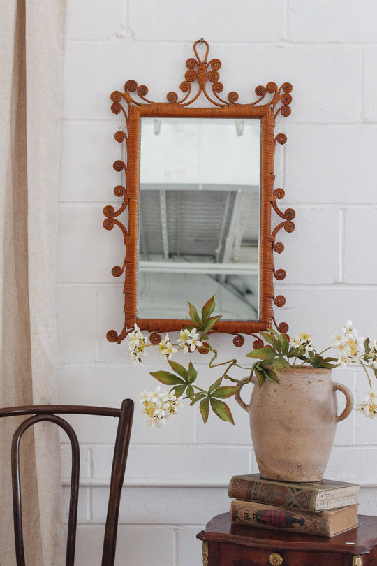 vintage french whimsical rattan mirror