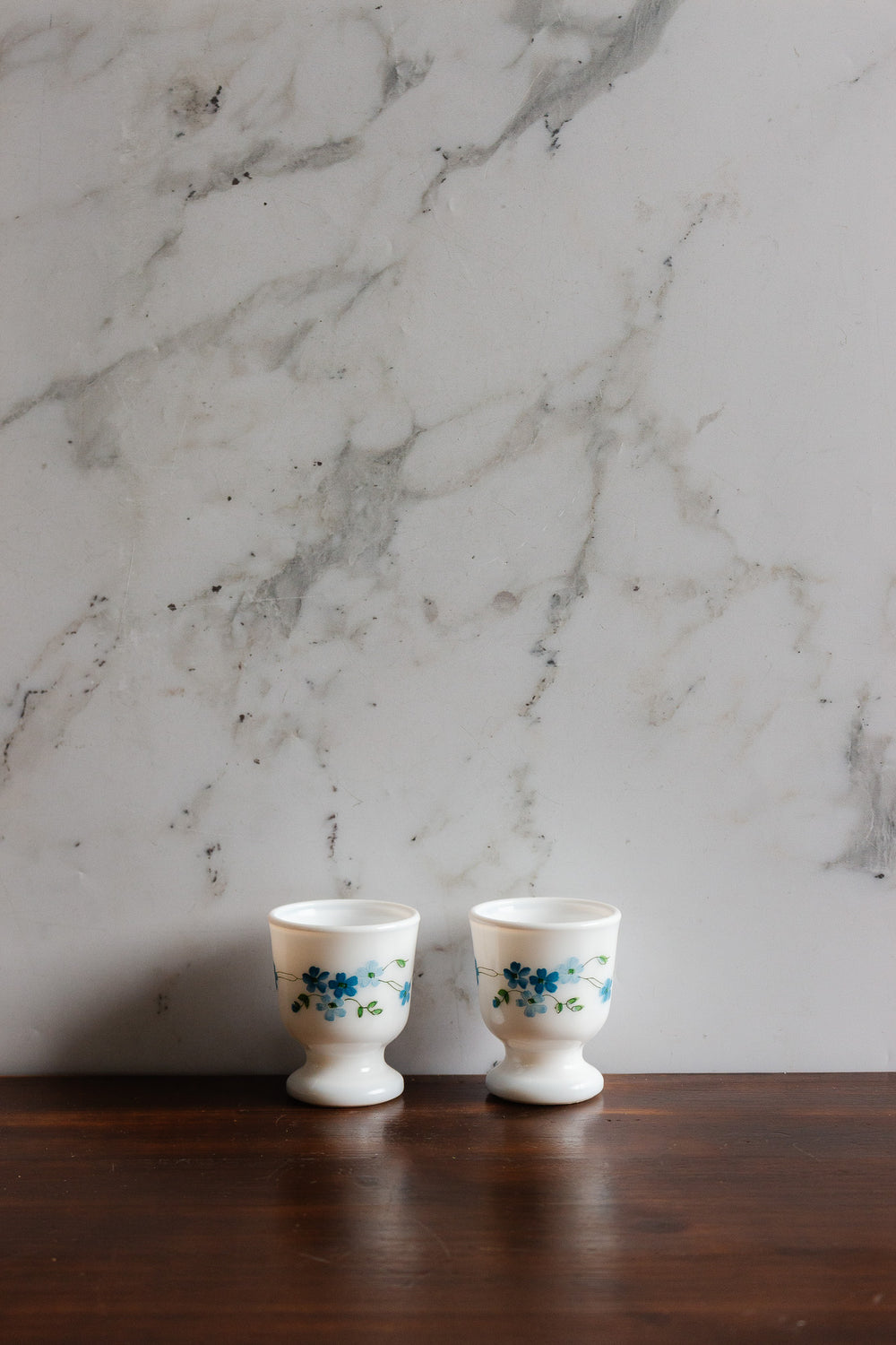 pair of vintage french milk glass eggcups