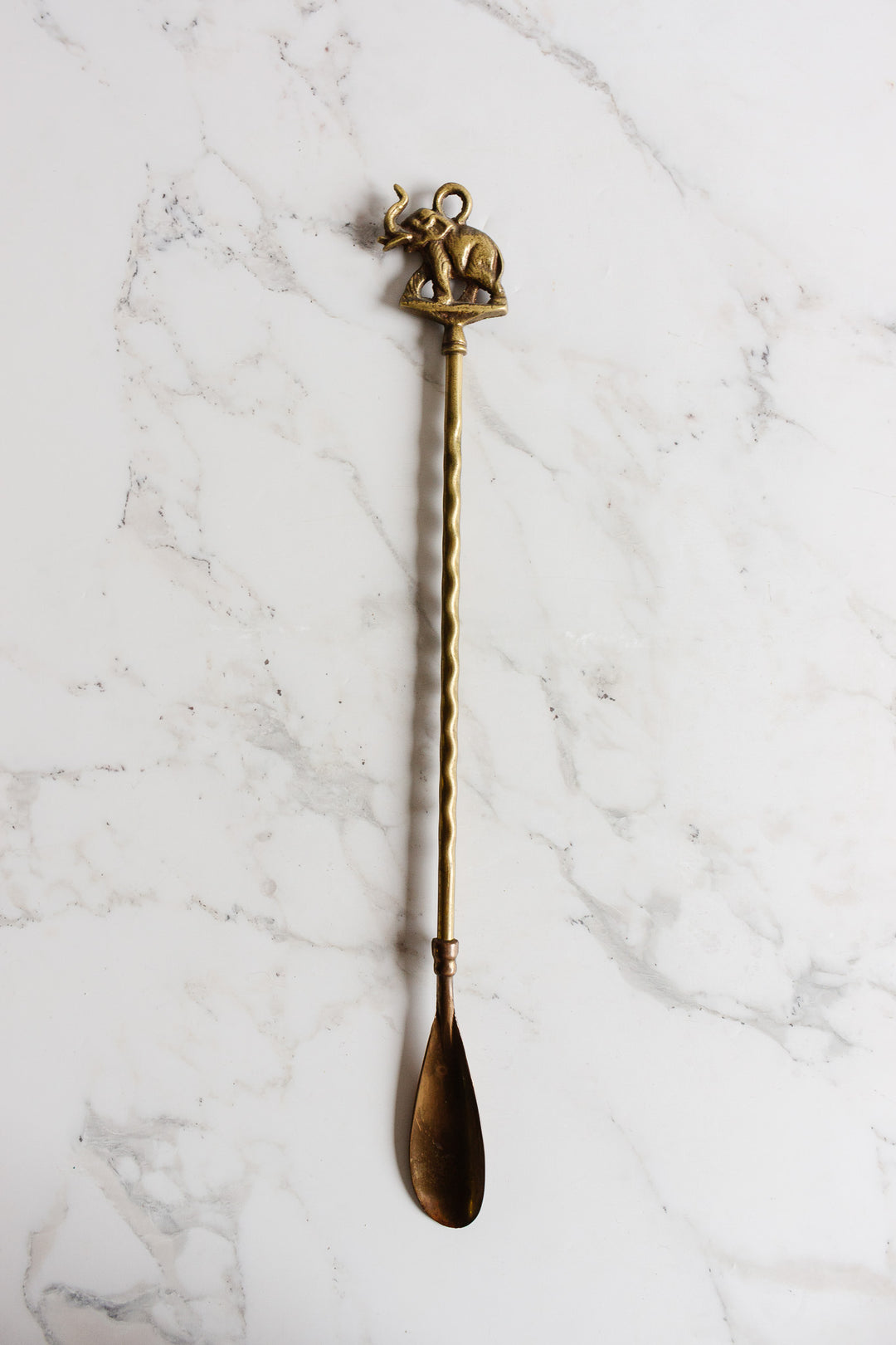 antique brass shoe horn: elephant or horse