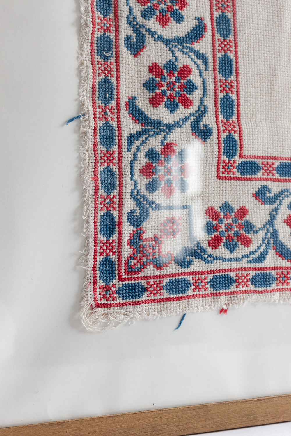 turn of the century French framed needlepoint textile remnant