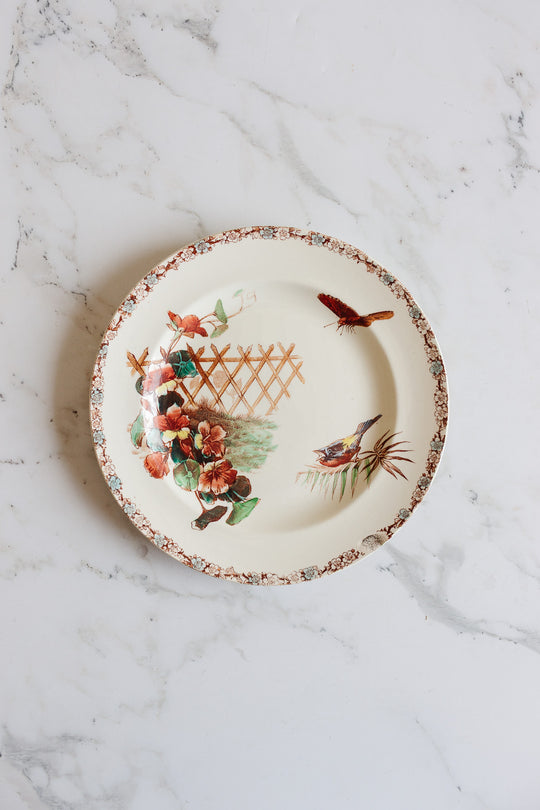1880s french terre de fer polychrome plate commissioned by Grand Dépôt