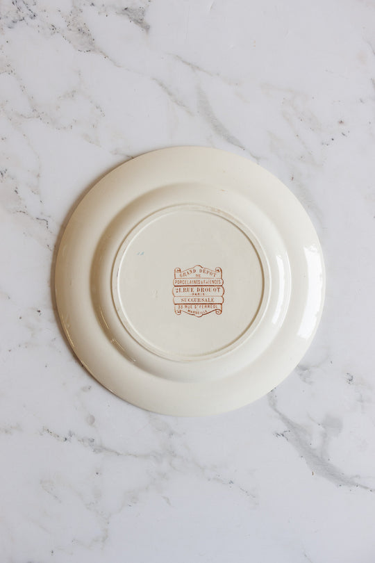 1880s french terre de fer polychrome plate commissioned by Grand Dépôt