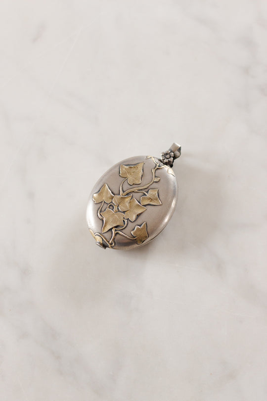 turn of the century French silver repousse art nouveau slide locket