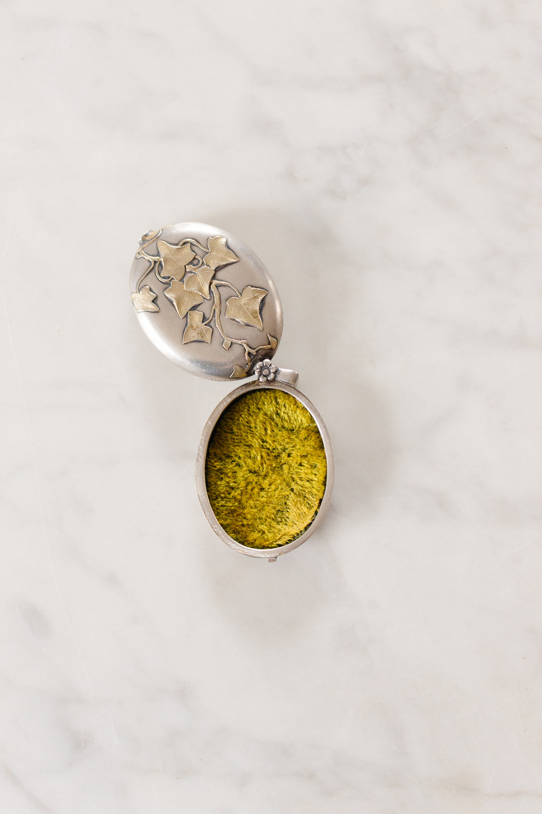 turn of the century French silver repousse art nouveau slide locket