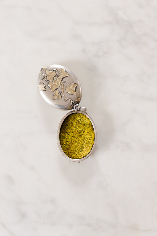 turn of the century French silver repousse art nouveau slide locket