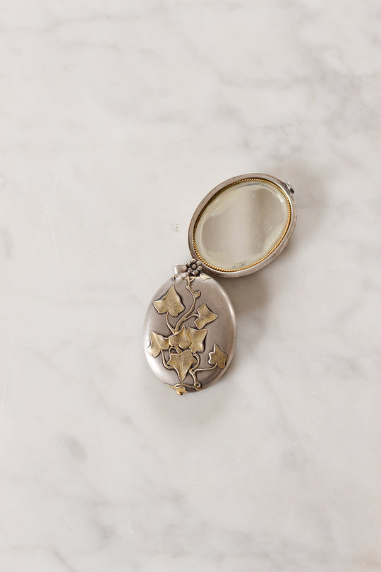 turn of the century French silver repousse art nouveau slide locket