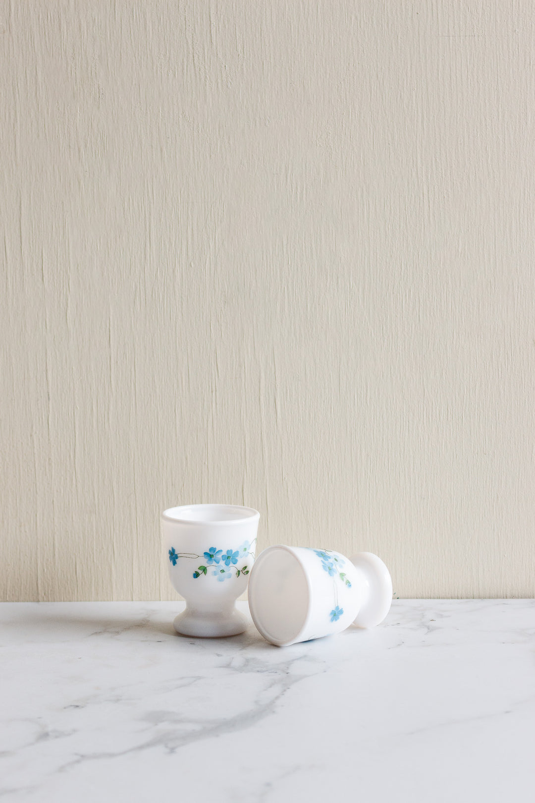 pair of vintage french milk glass eggcups