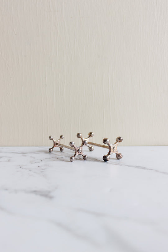 vintage french silverplated cogged knife rests, set of 7