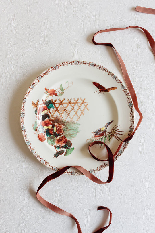 1880s french terre de fer polychrome plate commissioned by Grand Dépôt