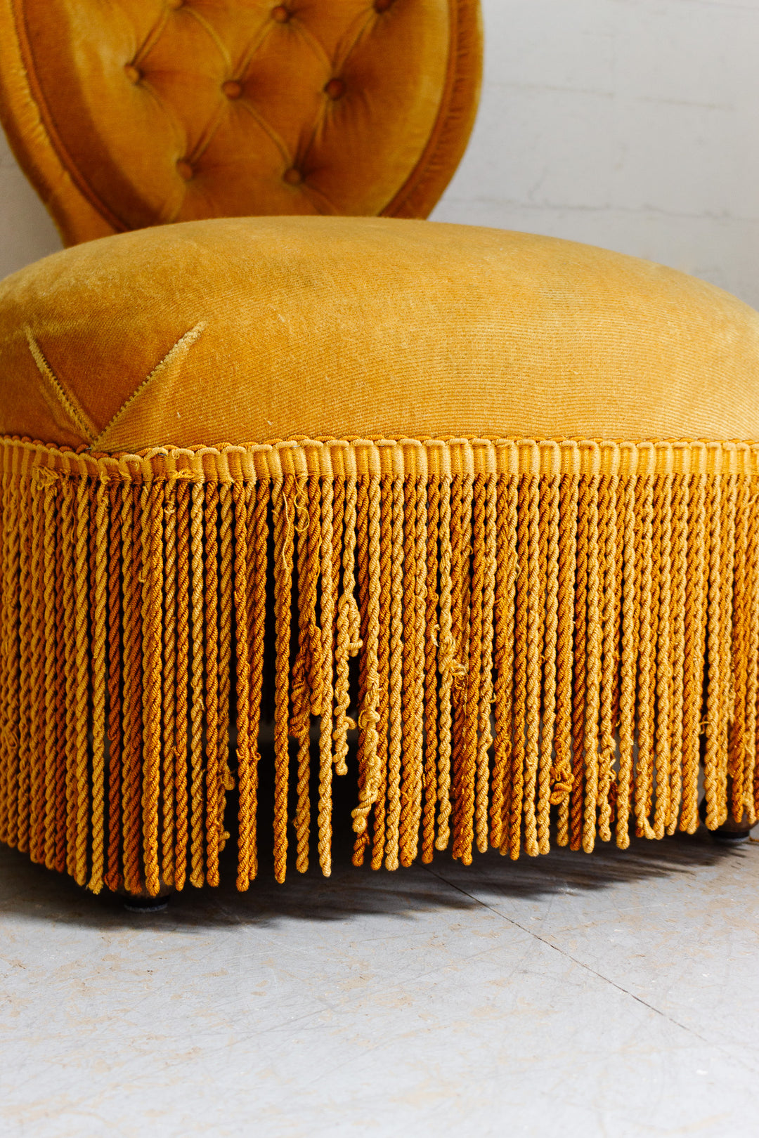 midcentury french golden slipper chair with fringe