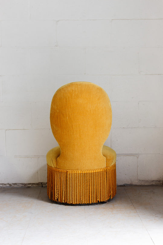 midcentury french golden slipper chair with fringe