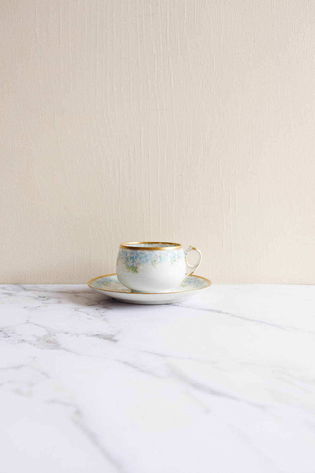 pair of antique limoges handpainted blue and gold teacups