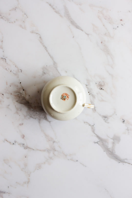 pair of antique limoges handpainted blue and gold teacups
