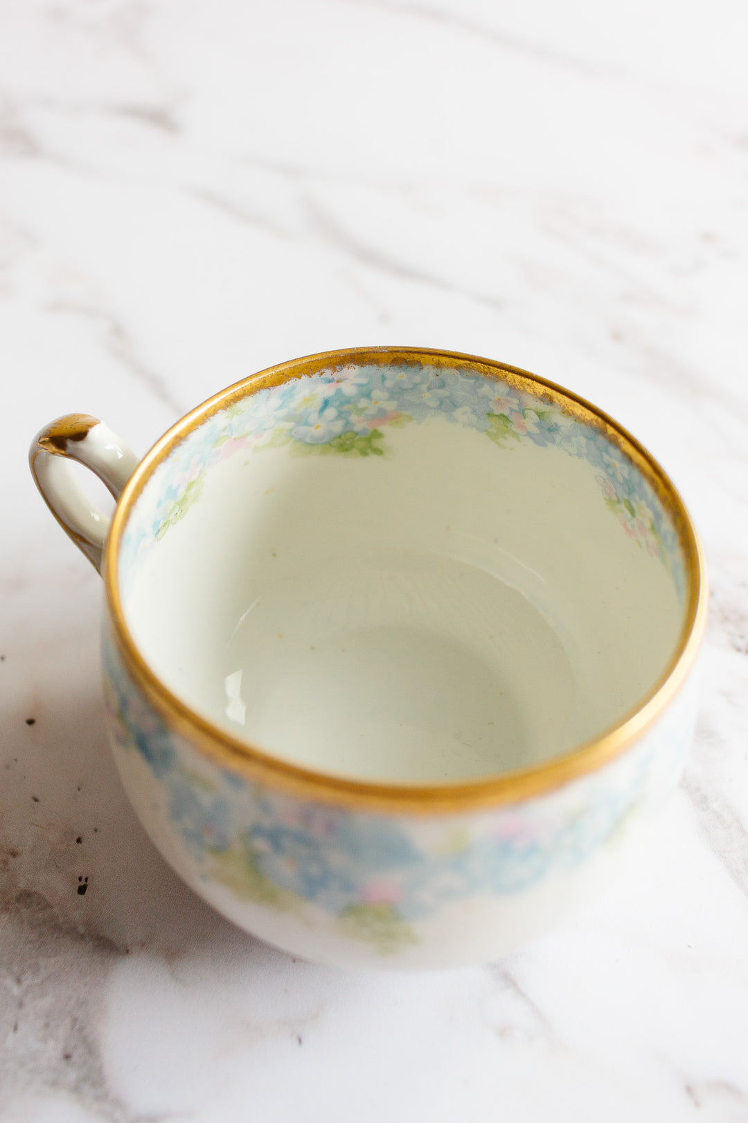 pair of antique limoges handpainted blue and gold teacups
