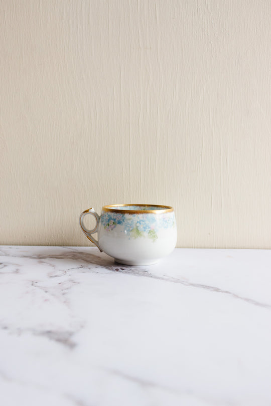 pair of antique limoges handpainted blue and gold teacups
