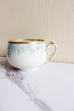pair of antique limoges handpainted blue and gold teacups
