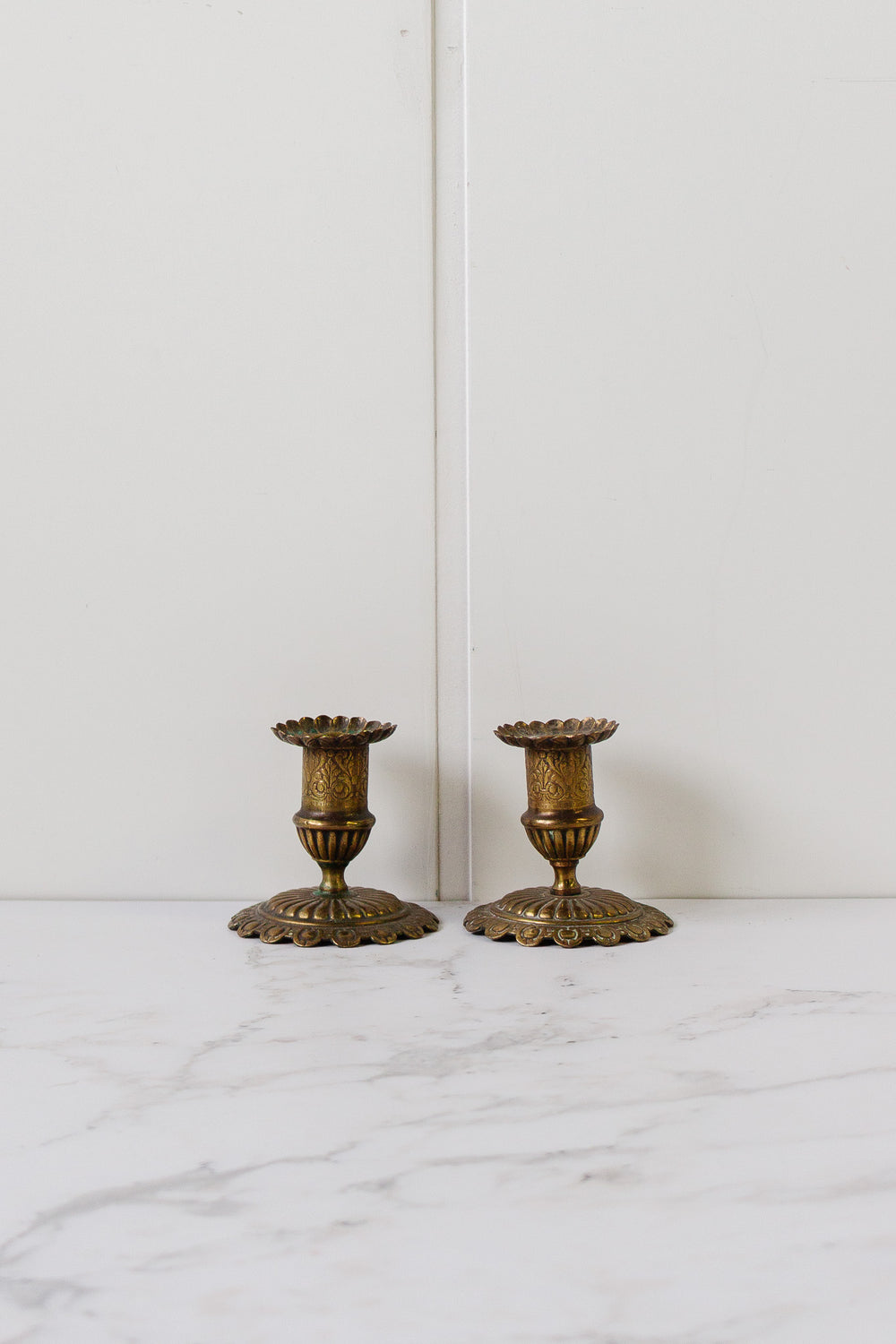 pair of vintage french brass candlesticks