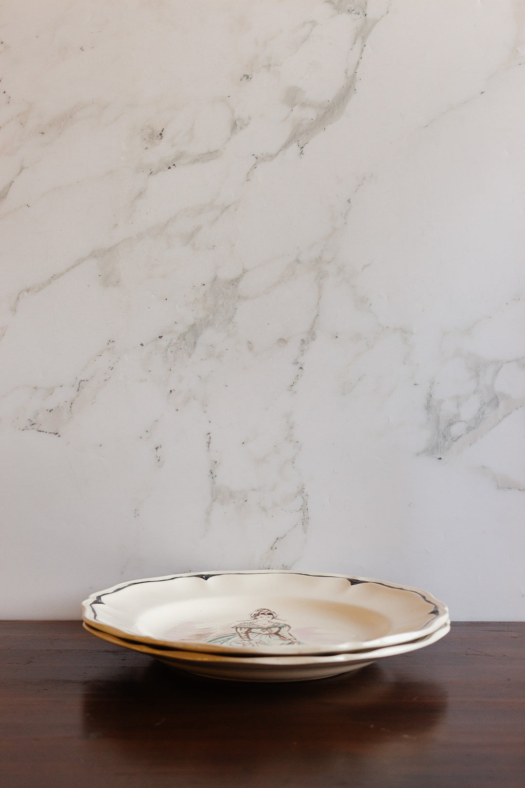 pair of 1920s sarreguemines talking plates, design by j colong