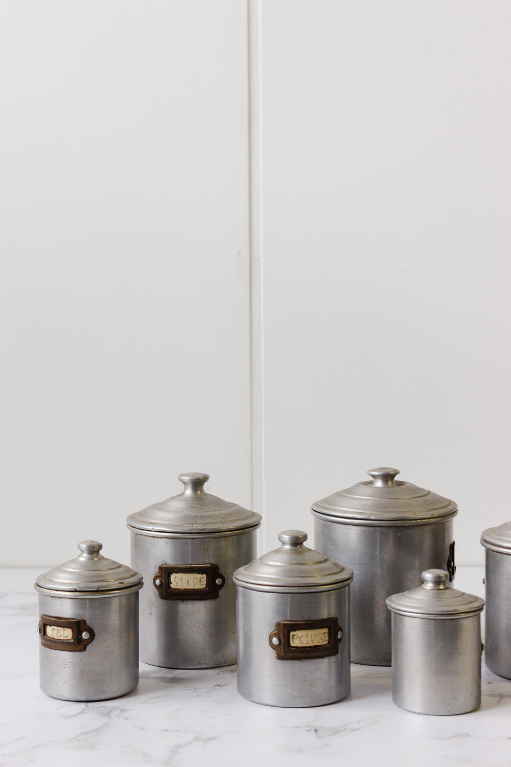 set of 6 graduated tin kitchen canisters
