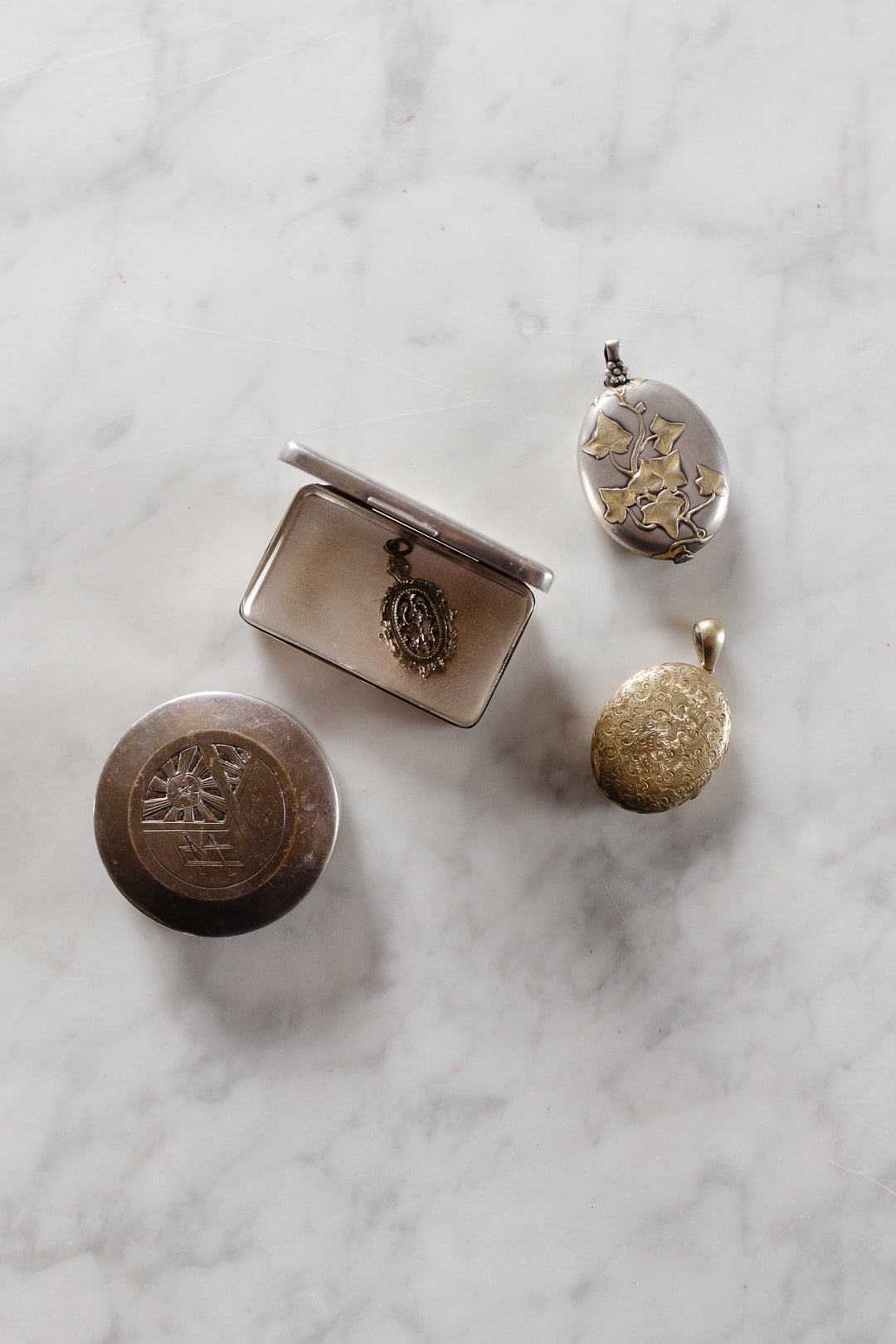 turn of the century French silver repousse art nouveau slide locket