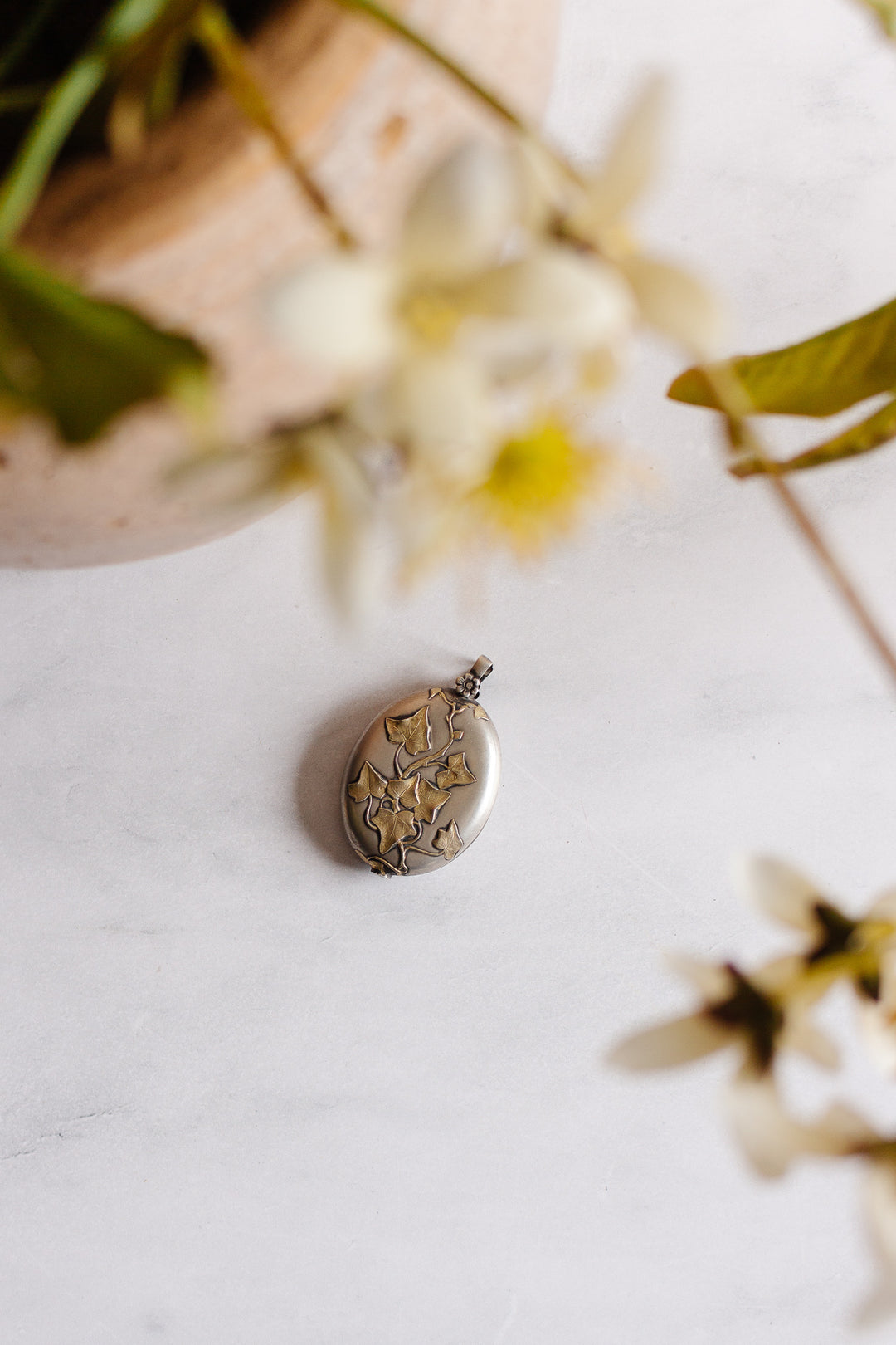 turn of the century French silver repousse art nouveau slide locket